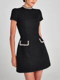 Vestido con bolsillo y ribete de perlas