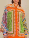 Camisa holgada con botones y mangas abullonadas