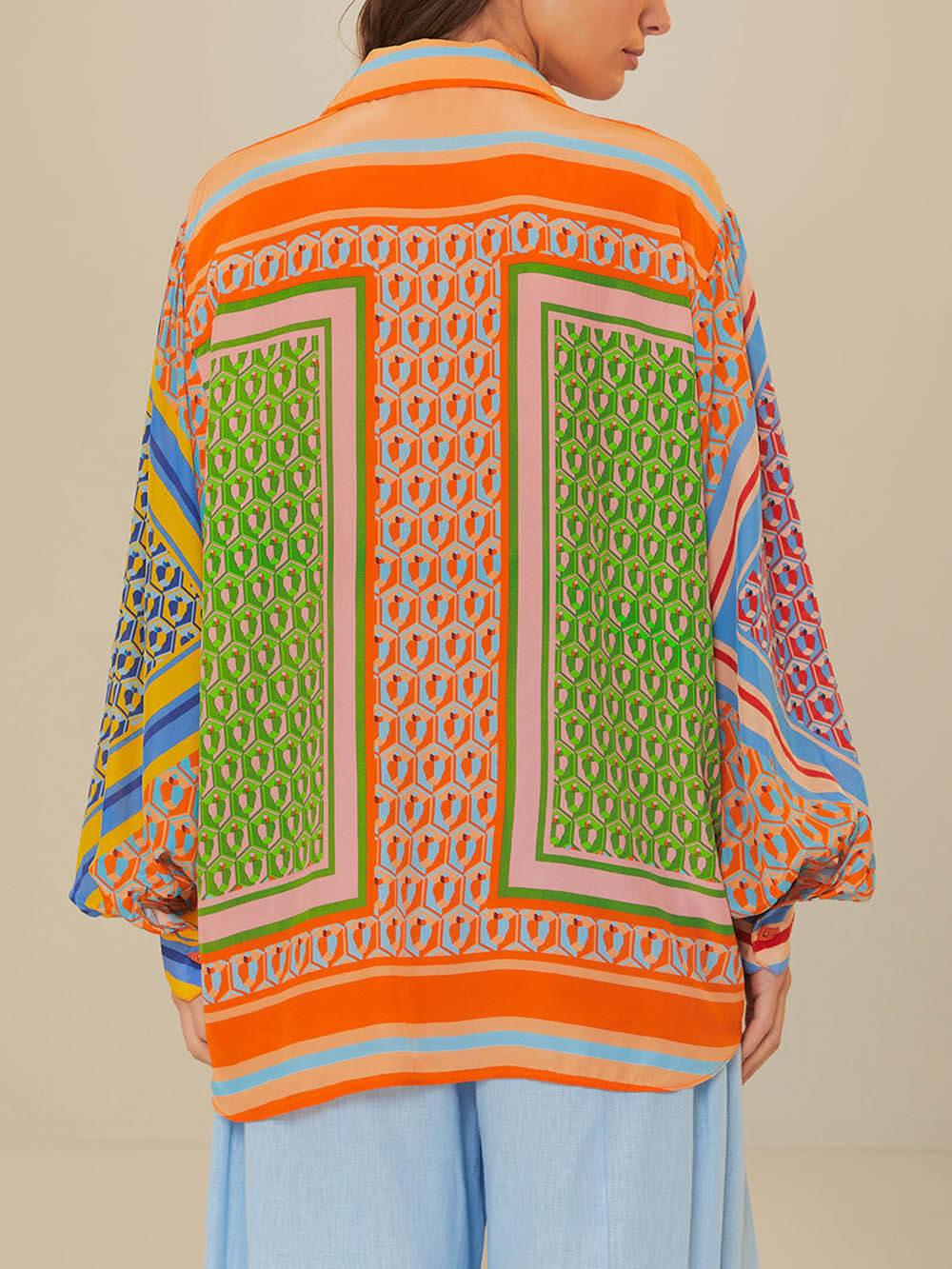 Camisa holgada con botones y mangas abullonadas