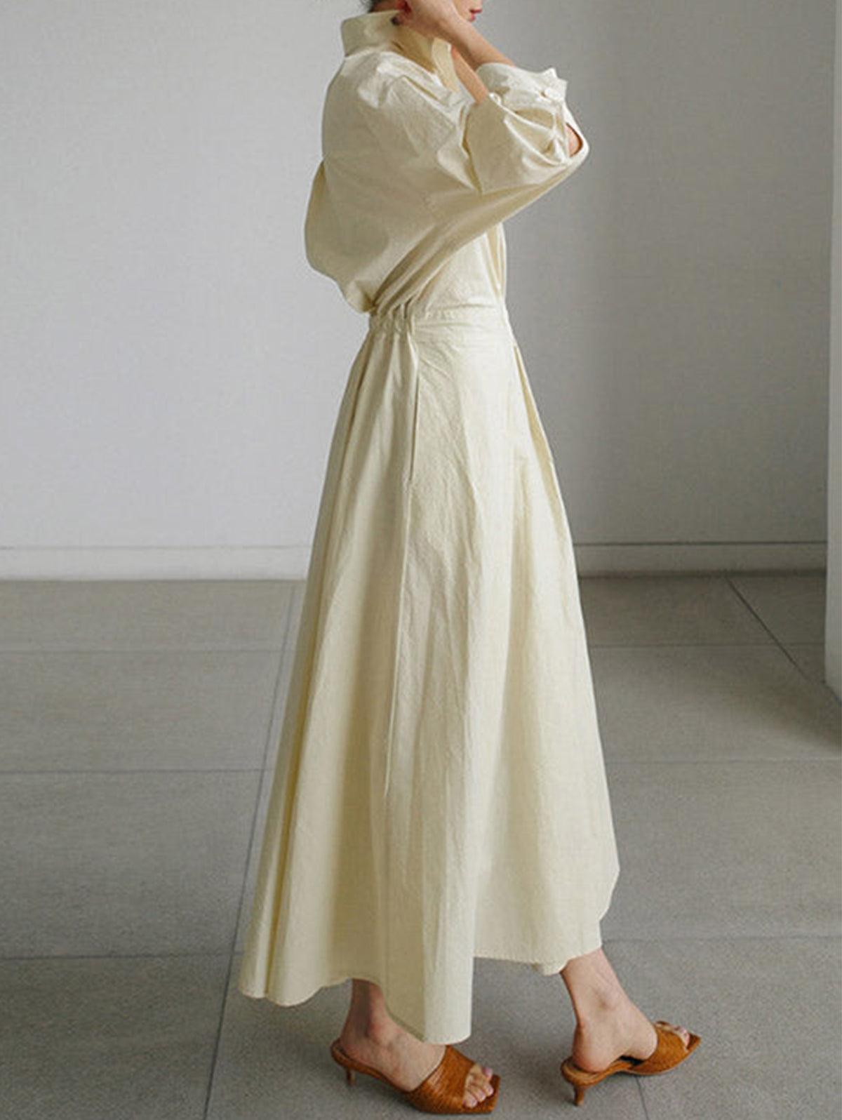 Vestido midi liso con solapa, botones y bolsillos