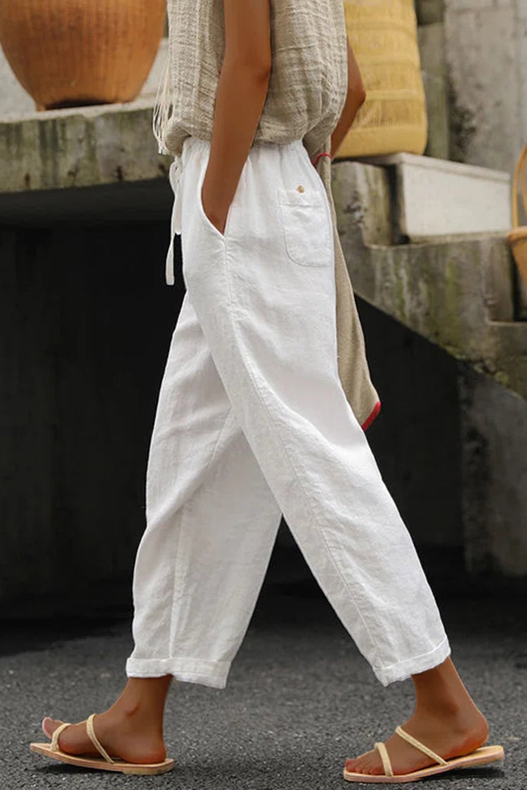 Pantalones holgados con cordones de color liso