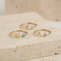 ANILLO CON INICIAL ABIERTO CON CIRCONITA