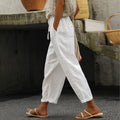 Pantalones holgados con cordones de color liso