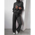 Conjunto de punto con cuello alto