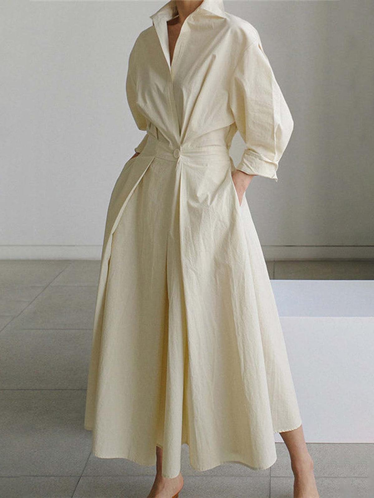 Vestido midi liso con solapa, botones y bolsillos