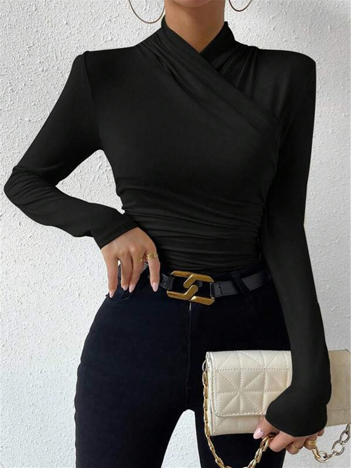 CAMISETA CRUZADA CON CUELLO PLISADO