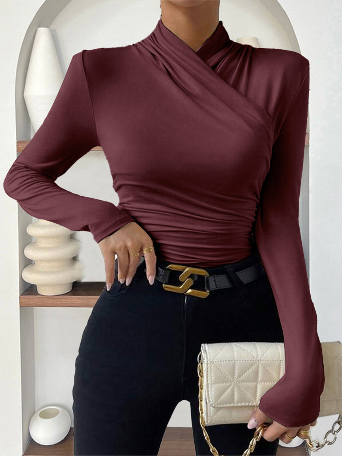 CAMISETA CRUZADA CON CUELLO PLISADO