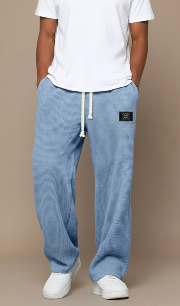 Pantalones con cintura ajustable y pierna ancha