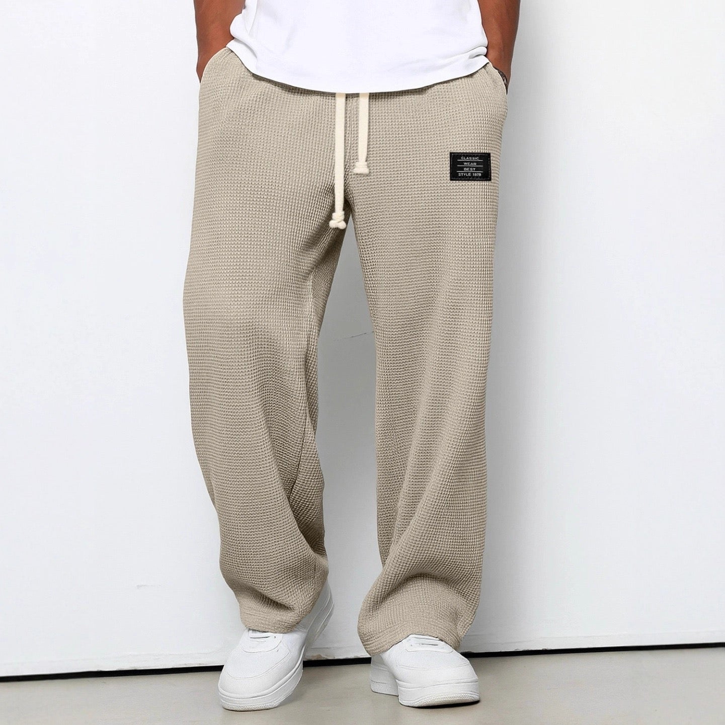 Pantalones con cintura ajustable y pierna ancha