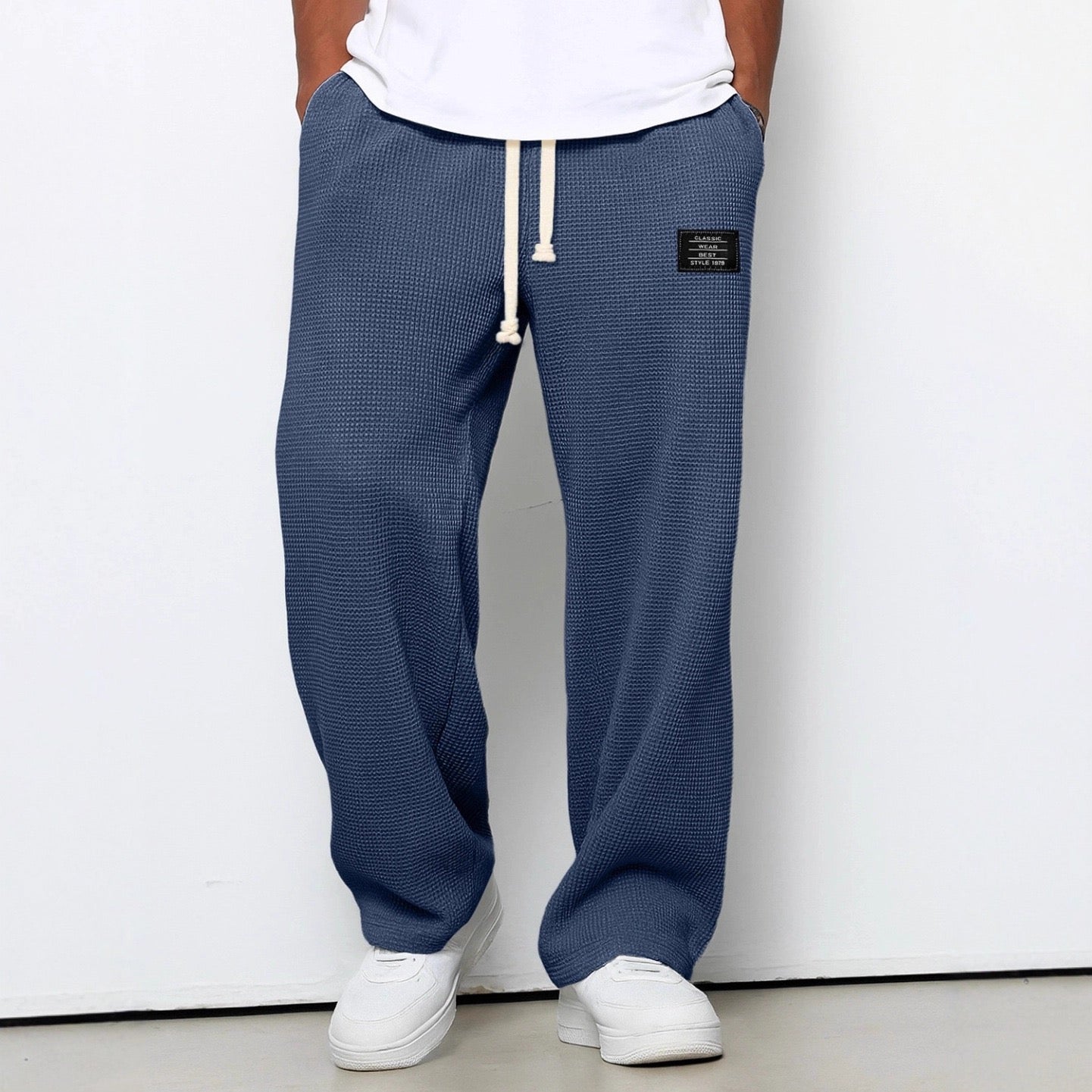 Pantalones con cintura ajustable y pierna ancha