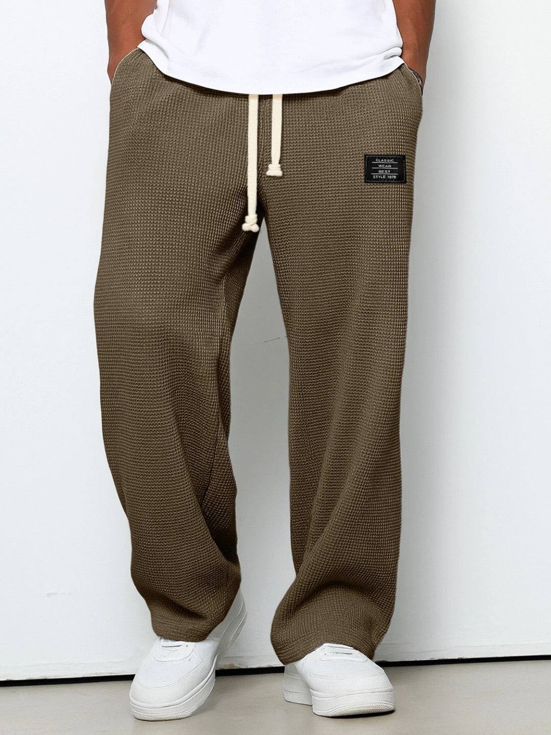Pantalones con cintura ajustable y pierna ancha
