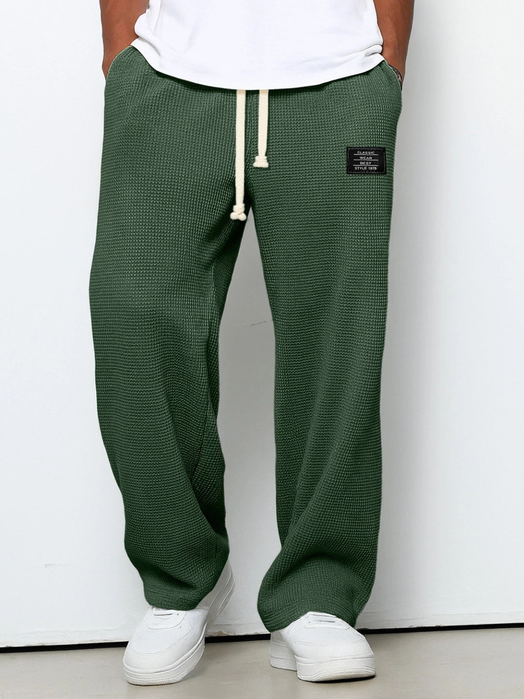 Pantalones con cintura ajustable y pierna ancha