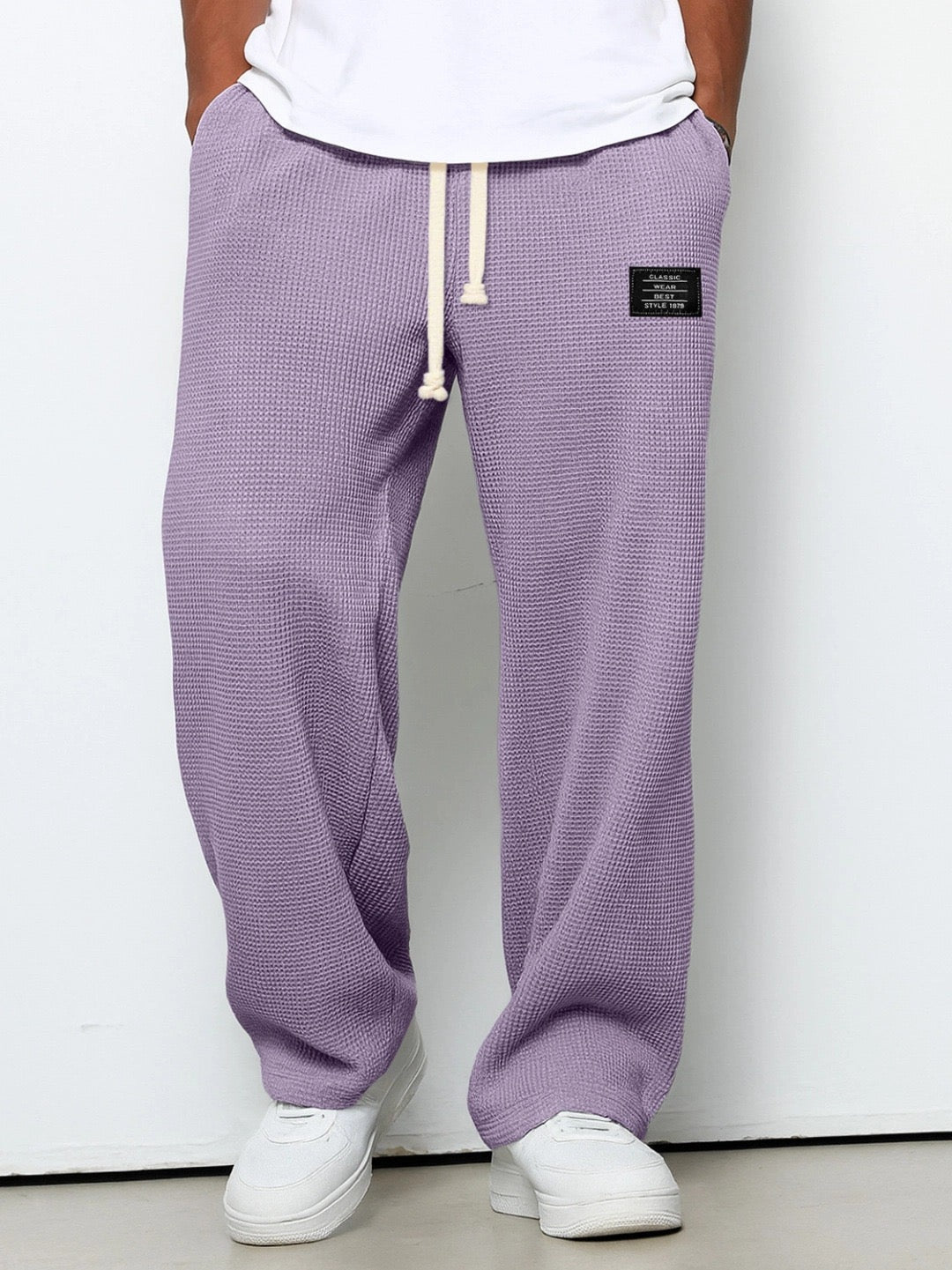 Pantalones con cintura ajustable y pierna ancha