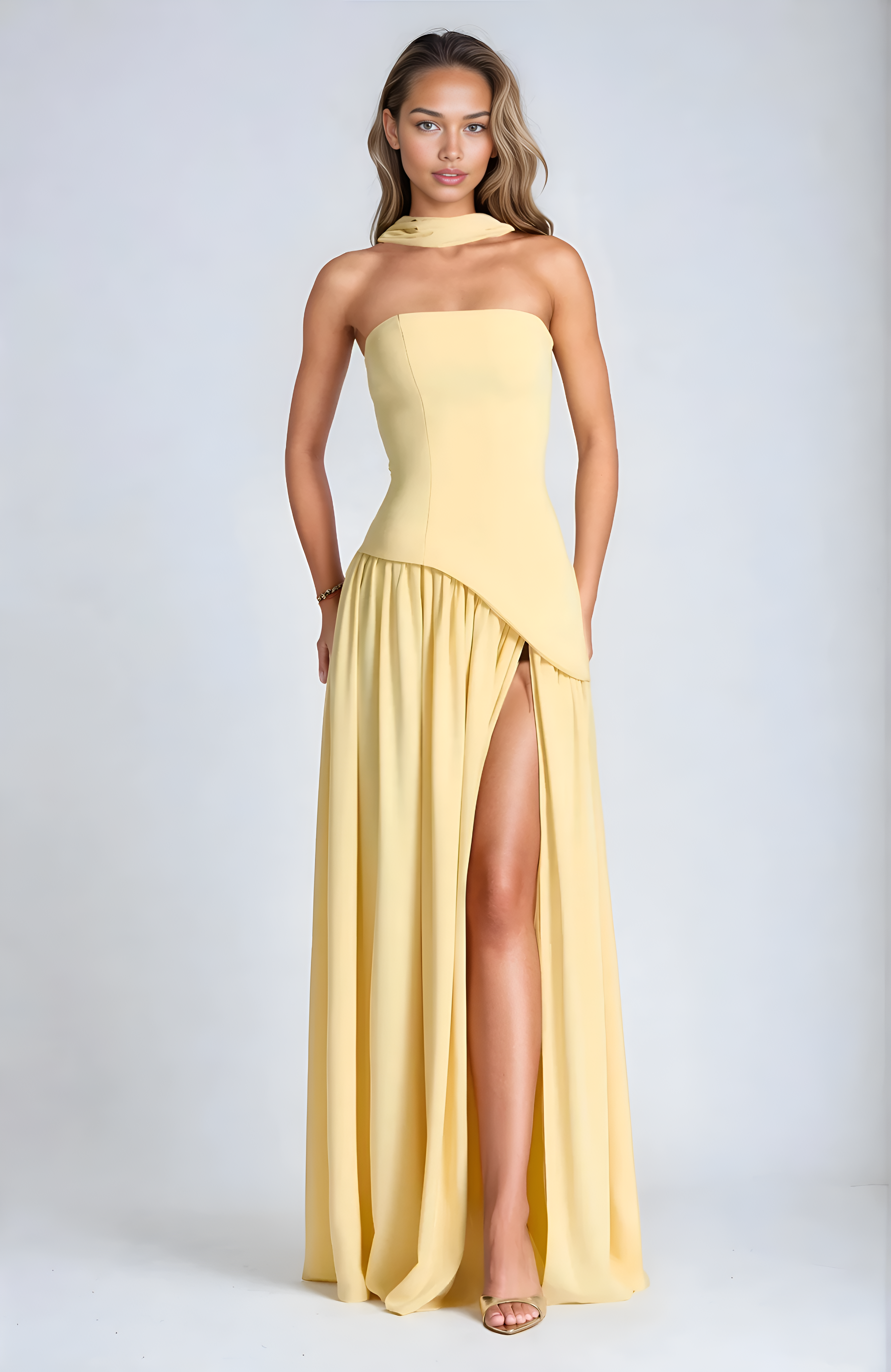 VESTIDO LARGO ASIMÉTRICO CON ABERTURA