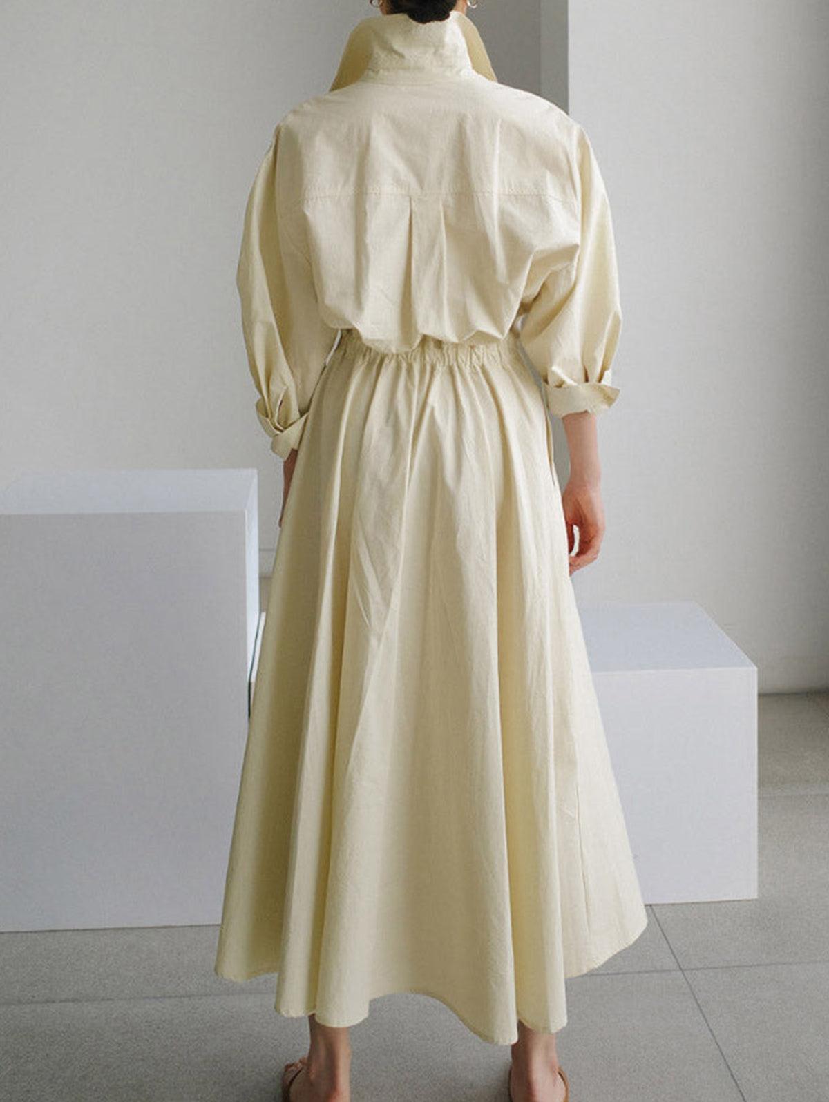 Vestido midi liso con solapa, botones y bolsillos