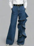 PANTALÓN VAQUERO WIDE LEG CON VOLANTE ASIMÉTRICO